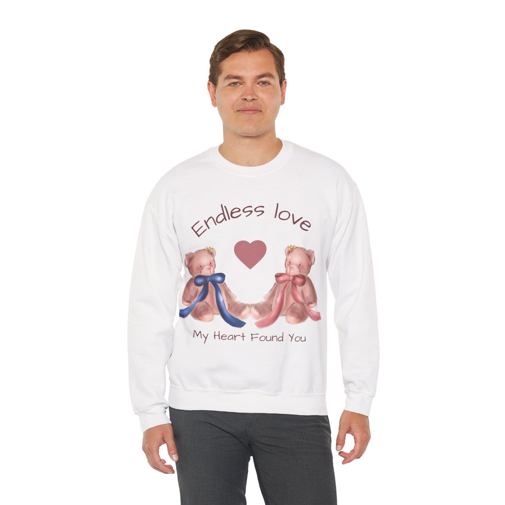 Person wearing a white sweatshirt with teddy bears and text on a white background