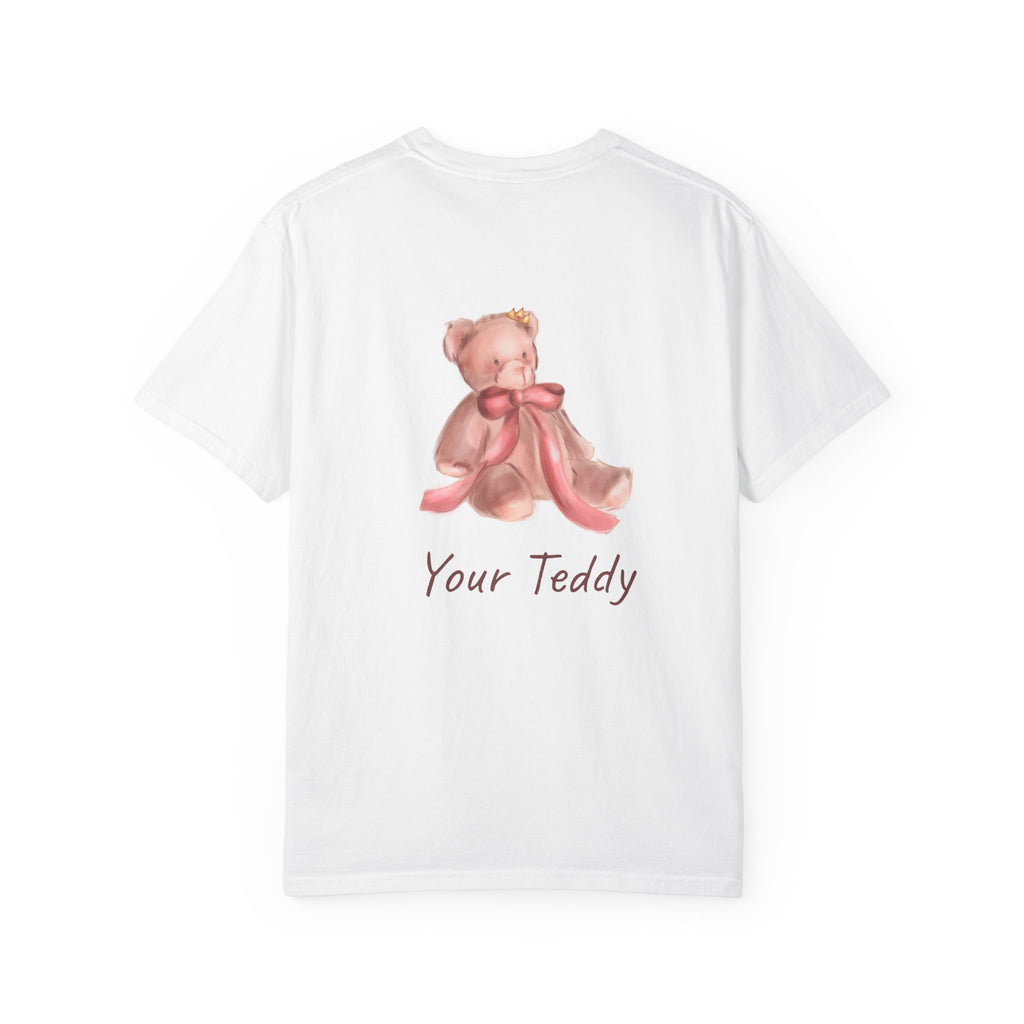 the back of the White t-shirt with a teddy bear design and 'Your Teddy' text on a white background