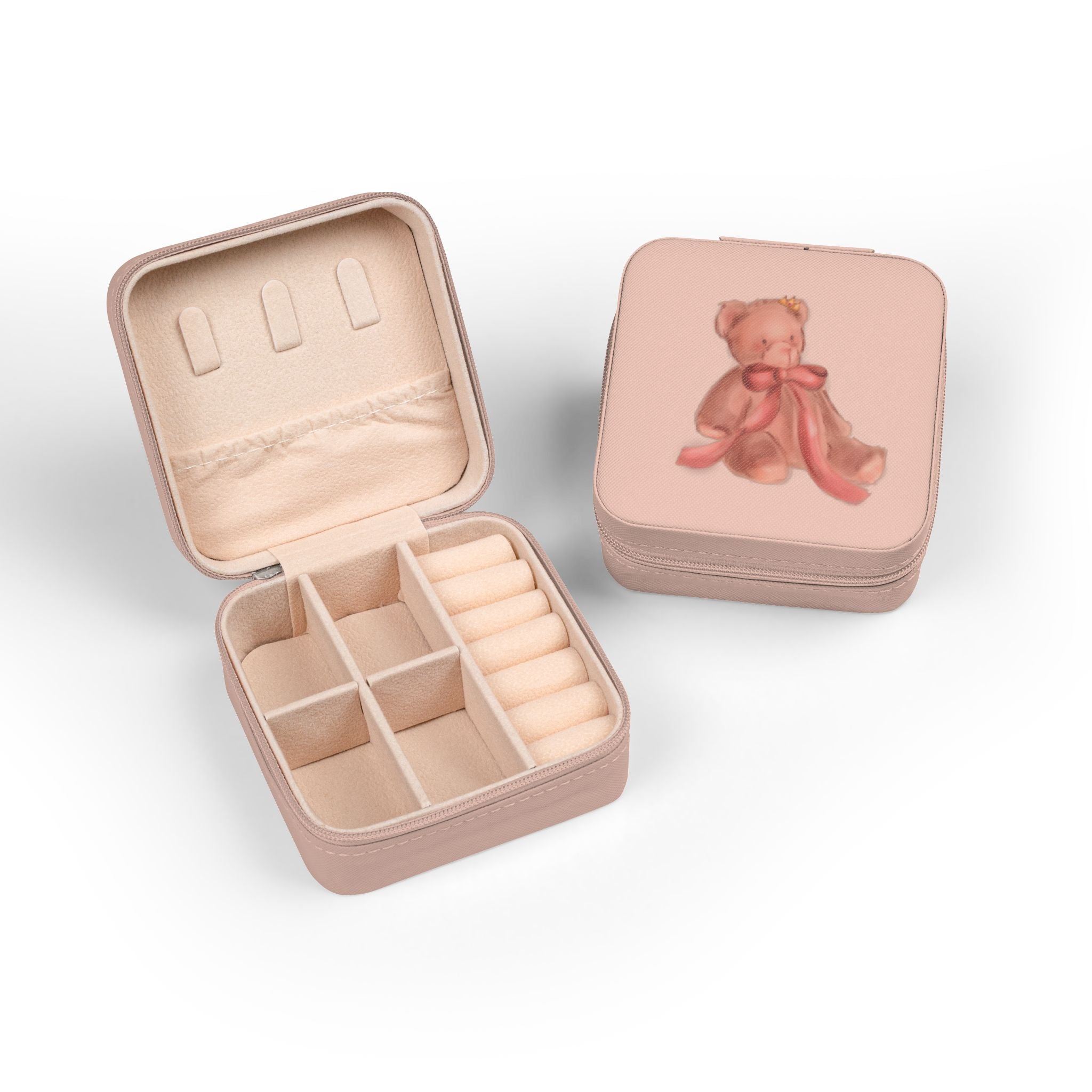 Pink jewelry box with teddy bear design on a white background
