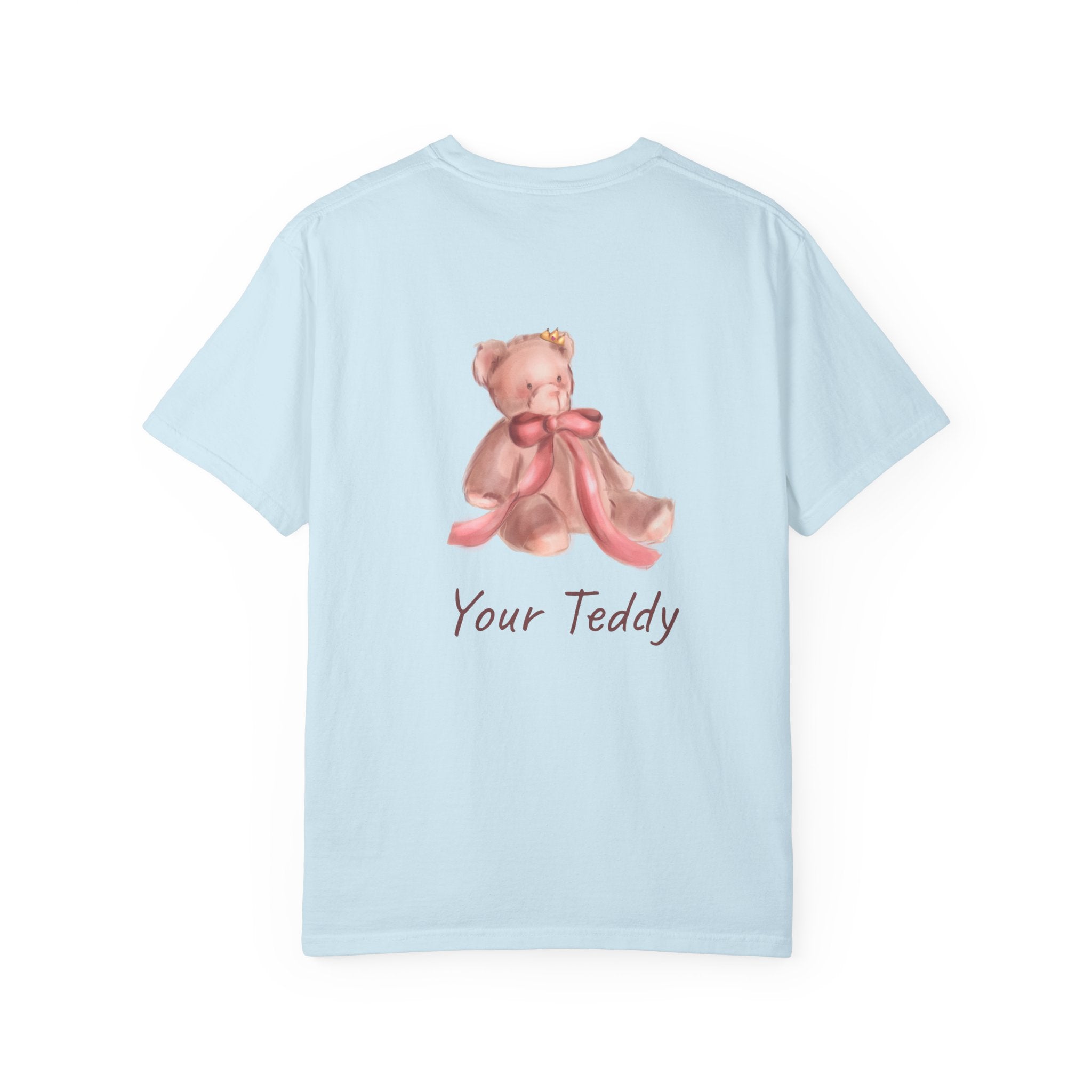the back of Light blue t-shirt with a teddy bear design and 'Your Teddy' text on a white background