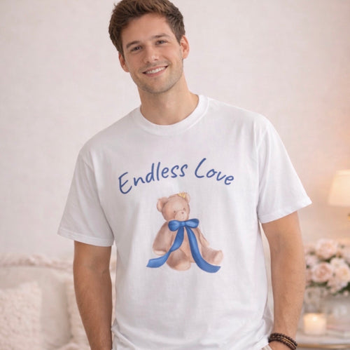 Man wearing a white t-shirt with a teddy bear and 'Endless Love' text.
